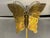 Pair of Oriental Brass Candlestick Holders with Butterfly Reflectors for your consideration. Each candlestick holder...