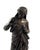 A french cast bronze figure of a classical maiden, circa 1900. Dark brown patination. Shown standing wearing draped robes....