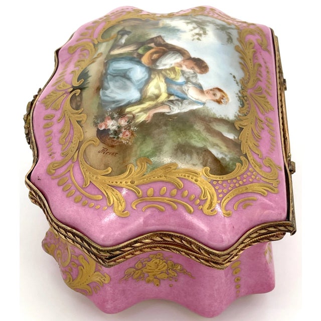 Sevres Style Pink Bombe Watteau Motif Ormolu Mounted Table Box Artist Signed J. Perrot France, circa 1890 An exquisite...