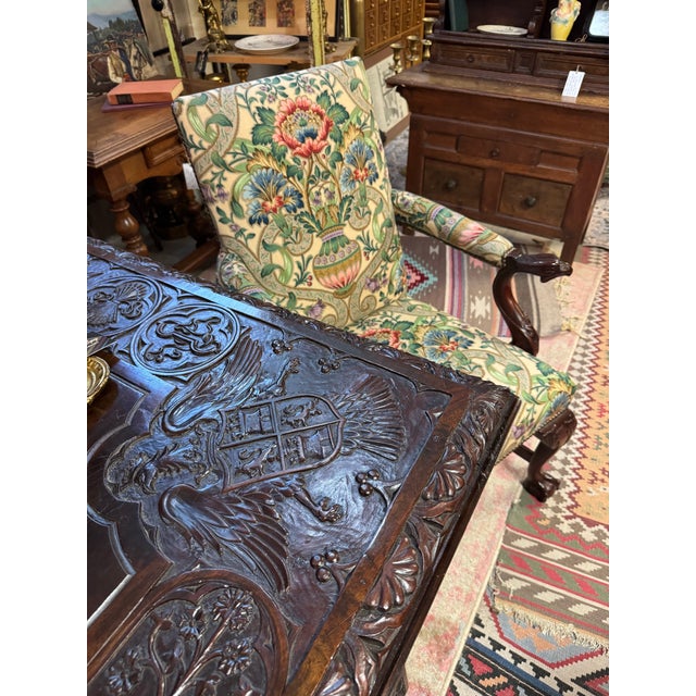 Pair of beautiful Chippendale style arm chairs that feature eagle head arm rests and ball & claw feet, by Baker Furniture...