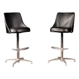 Pair of MCM Black Vinyl Swivel Chairs For Sale