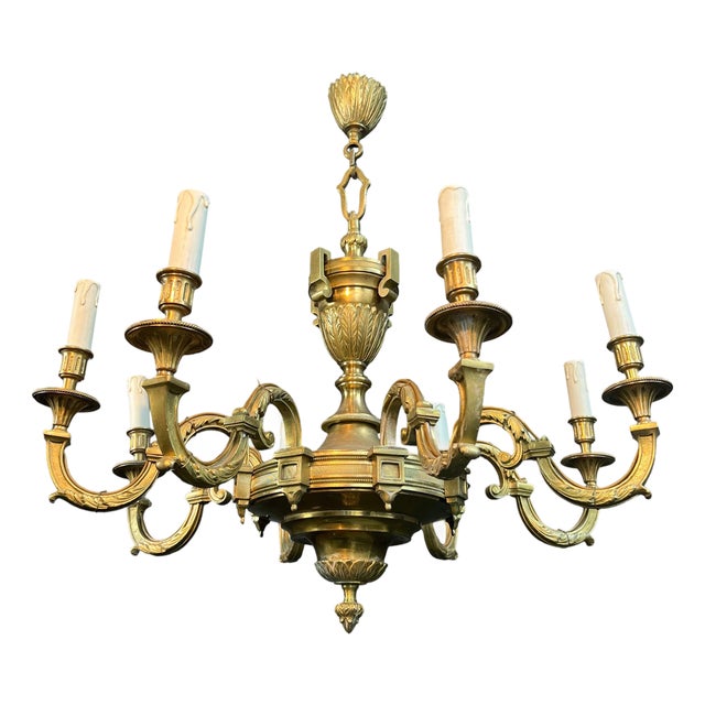 1940s Louis XVI style 8-arm chiseled bronze chandelier by Lucien For Sale