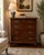 Classic craftsmanship defines this Theodore Alexander four-drawer chest, beautifully finished in rich mahogany with a...