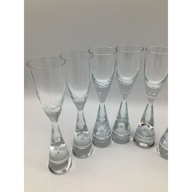 This is a rare set of 8 Holmegaard Denmark Princess Teardrop crystal Cordial flutes. They were designed in 1957 by Bent...