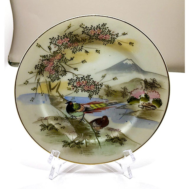 5 antique Japanese Kutani porcelain plates. Based on the maker's mark and artistic style, these pieces date back to the...