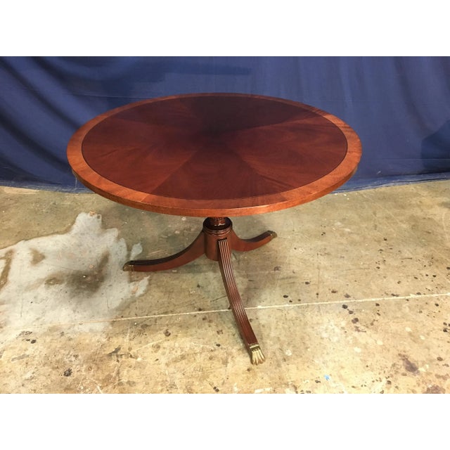 This is made-to-order round traditional mahogany accent or foyer table made in the Leighton Hall shop. It features a field...