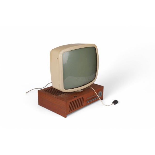 The lumavision teak tv is a distinctive example of 1950s Scandinavian design, created in Sweden and designed by Stig...