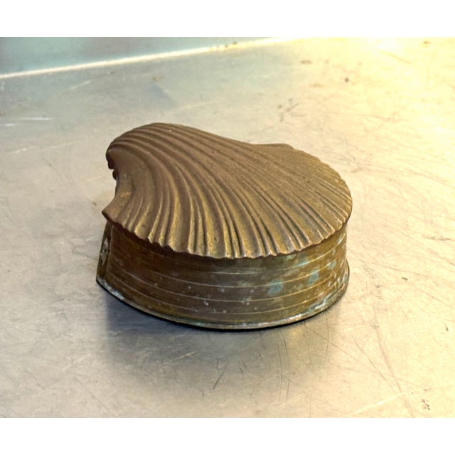 1950s-60s small brass hinge-top shell box. Some patina to metal throughout but otherwise excellent condition.