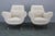 Pair of restored Italian armchairs from the 1950s featuring newly upholstered boucle fabric, elegant curved arms, and...