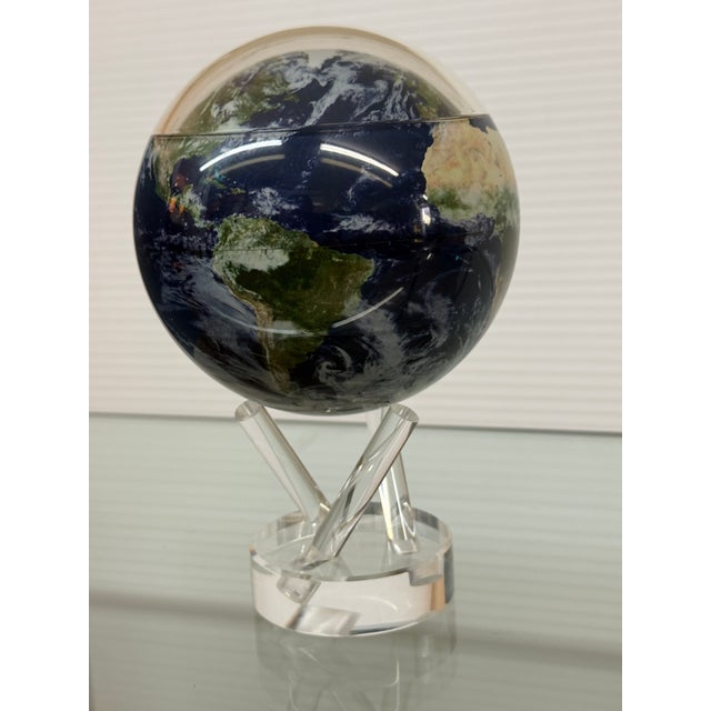 Design Plus Gallery presents the Rotating Earth Globe on Acrylic Stand from MOVA. from space. The Earth with Clouds MOVA...