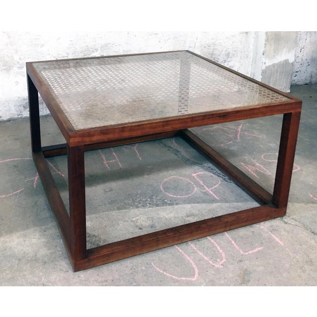 Mid-Century Modern Coffee Table by Kai Kristiansen. Made from solid teak and glass within a hand-woven caned frame. A...