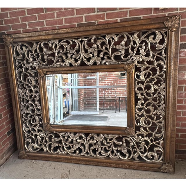 20th Century Ornately Carved Gilt Wood Wall or Floor Mirror This large mirror is magnificent - a showstopper and...