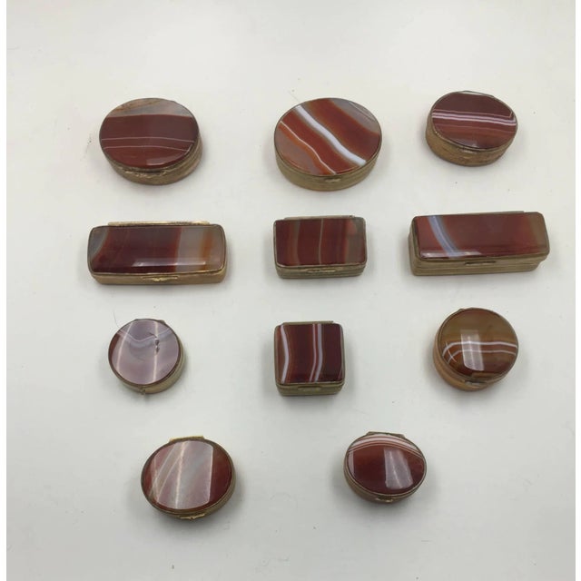 Boxes of varying shapes and sizes. Some round, oval, square and rectangular.