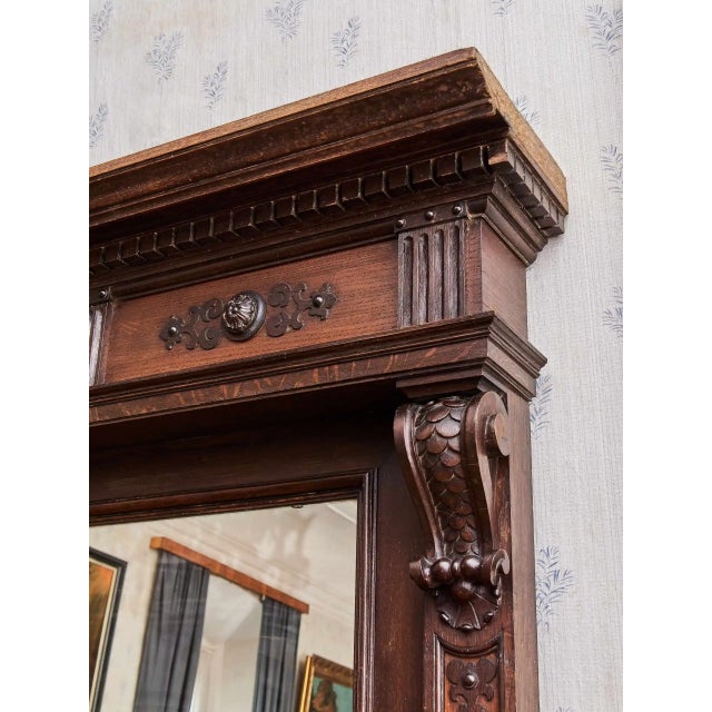 An impressive neo-Renaissance mirror that will impress not only with its size but also with its detailed workmanship. The...
