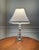 This elegant midcentury vintage lamp features stacked prismatic clear leaded glass crystals for a sparkling display. It is...