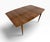 A beautiful Mid-Century Modern Lane “Tuxedo” walnut dining table, circa 1960s. This classic design showcases rich walnut...