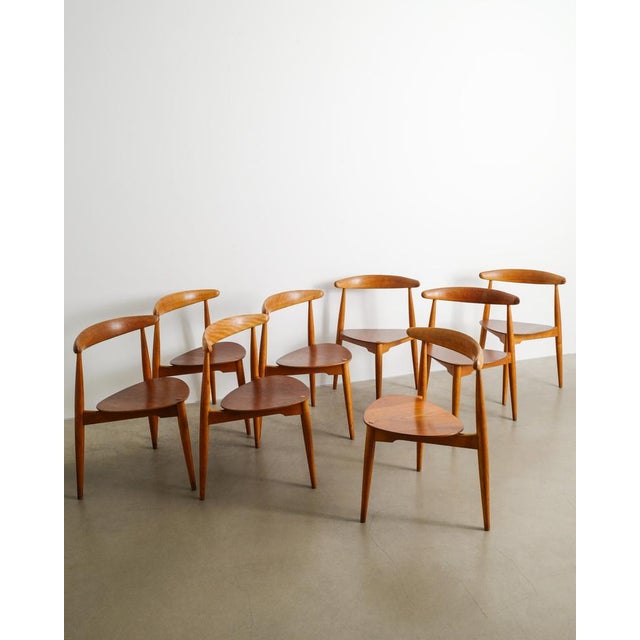 Rare set of eight three legged danish mid century "fh 4103 heart" wooden dining chairs in stained oak with teak seats by...