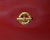 A beautifully crafted authentic Celine vanity cosmetic case in rich red pebbled lambskin leather, finished with elegant...