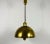 Brass pendant lamp by WKR made in Germany in the 1970s. It is fascinating with its exclusive design. The height of the...