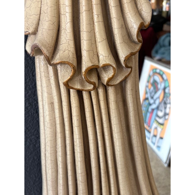 Stunning faux draped linen with custom antique finish and gold paint accents . The decorative part of the frame is molded...