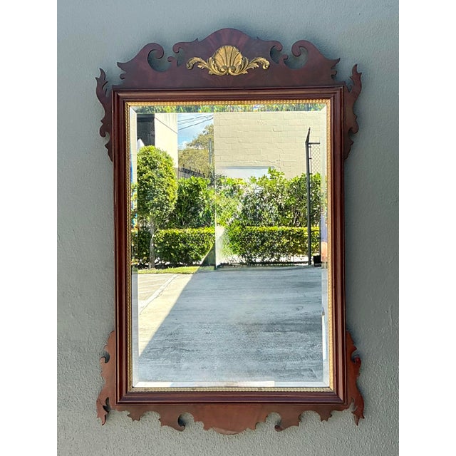 This stately Chippendale-style wall mirror by Councill Craftsmen is a superb example of high-end American traditional...