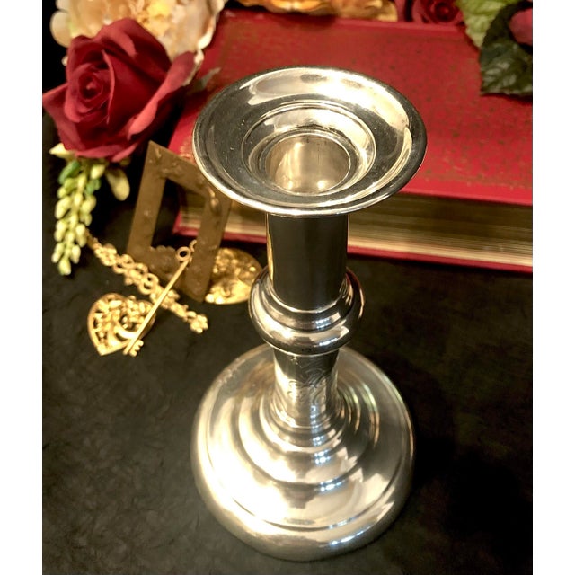 This is for an antique Sterling candle holder that is unmarked and measures: 7.5 inches tall x 4 inches in diameter and...