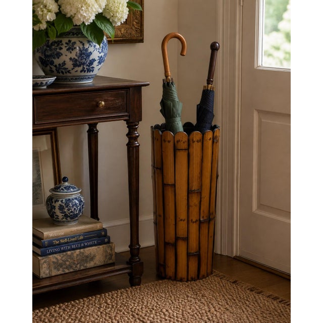A handsome circa 1970s bamboo umbrella stand with a tall cylindrical form composed of vertically arranged bamboo segments...