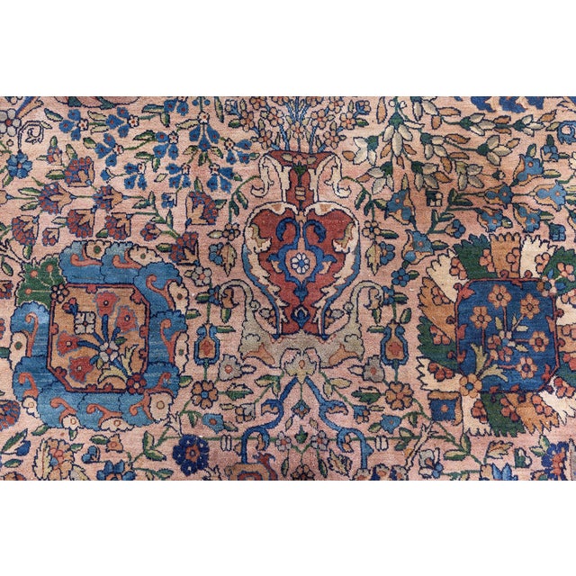 This magnificent antique Persian Kirman rug is a breathtaking example of traditional Persian textile mastery. Woven around...