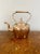 Large antique George III copper kettle having a shaped handle and spout, lift off lid with the original original brass knob.