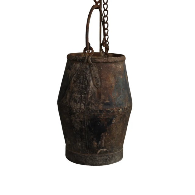 This 19th-century French wrought iron stand is a striking example of the intricate and durable craftsmanship...