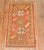 An early 20th-century orange color antique turkish oushak scatter throw size rug Measures: 2' x 4'1”.