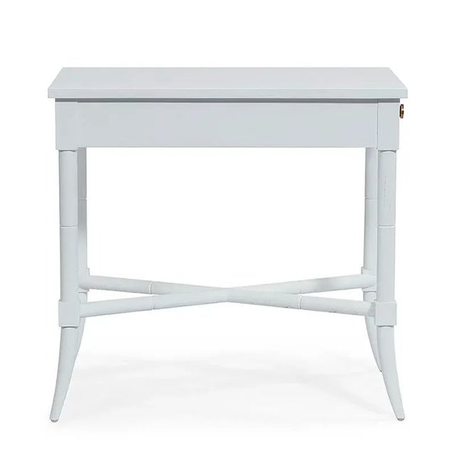 Adapted from the popular 19th Century English Regency style. This handy table has a rectangular top over four turned...