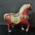 1. **Hand-Painted Ceramic Horse Statue, Red Body, Cream Mane & Tail, Saddle & Bell Accents** For Sale In New York - Image 6 of 6