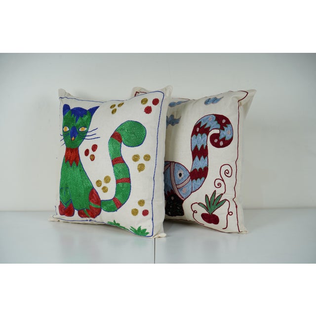 Uzbek Suzani Pillow Cover Elevate your home decor with our Turkish Suzani Pillow Cover, featuring exquisite vintage Uzbek...