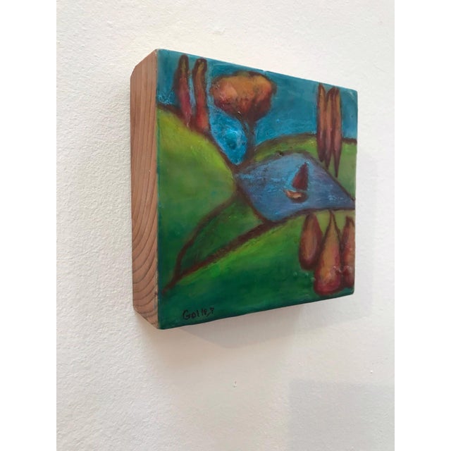 Abstract Idyllic 34 by Carrie Goller | Encaustic on wood panel Landscape with a tree, water, and a sailboat. For Sale - Image 3 of 3