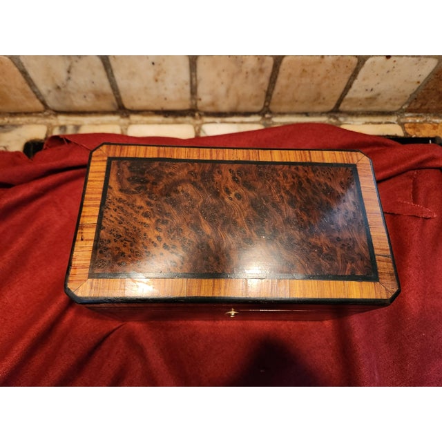 19th-century tea caddy in precious wood marquetry very good condition with its four lids and interior lining very discreet...