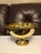Add a touch of warm, reflective glam to your tabletop with this vintage Hollywood Regency polished brass pedestal bowl....