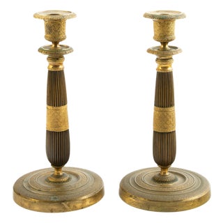 Pair of French Restoration Period Chased Gilt Bronze Candlesticks with Bobèches For Sale