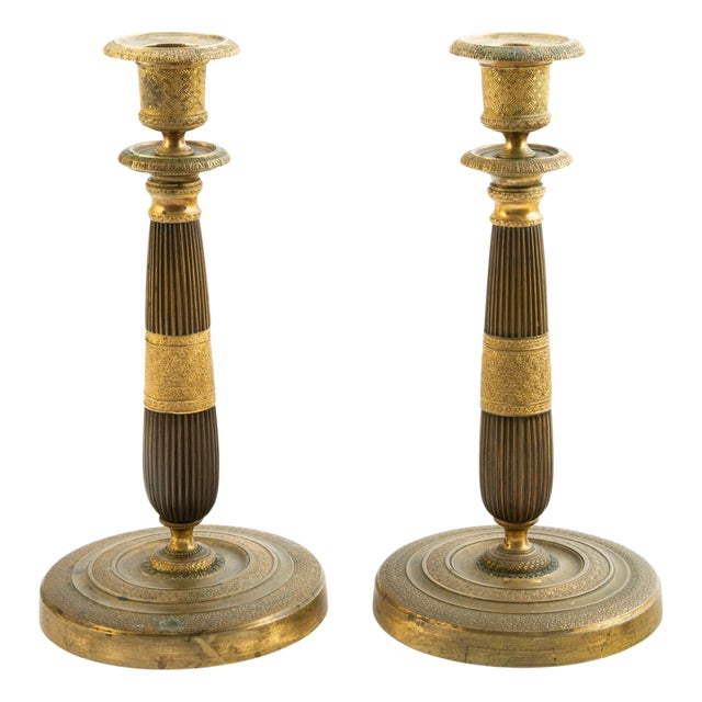 Pair of French Restoration Period Chased Gilt Bronze Candlesticks with Bobèches For Sale