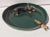 Great little green dish mounted with a small red fox whose body show half inside the dish and half outside the dish with a...