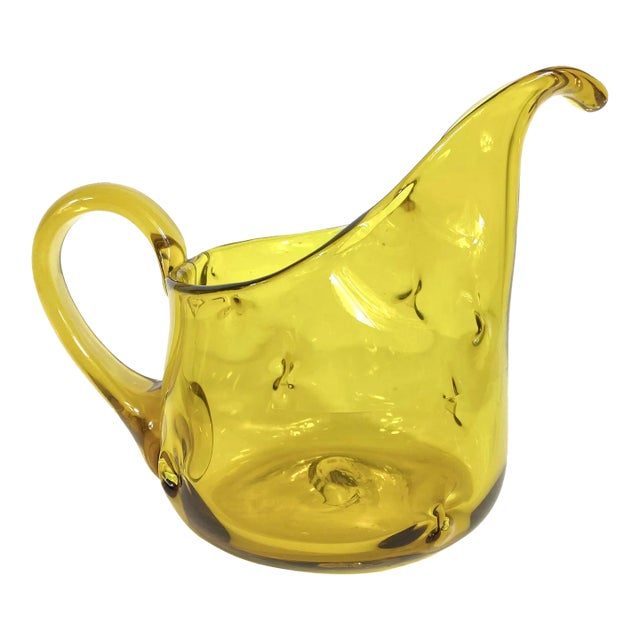 Mid Century Modern Amber Art Glass Pitcher With Pinched Hand Blown Glass and a Large Lip For Sale