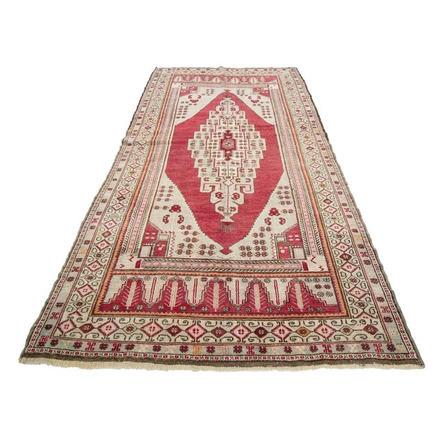 Handknotted vintage rug from Konya region of Turkey. Approximately 50-60 years old. In very good condition