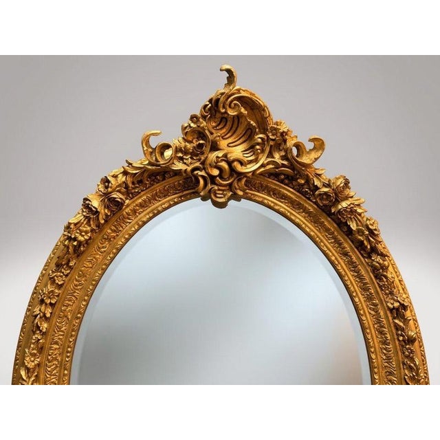 Elevate your interior decor with this breathtaking Rococo French-style large oval mirror, a stunning statement piece...