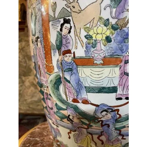 A very nice large oriental vase available in our showroom. Hand finished with gilt elements. In very good , vintage...