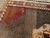 Brown Galerie Shabab Collection Mid-20th Century Handmade Turkish Tribal Room Size Rug in Brown Yellow and Red For Sale - Image 8 of 10