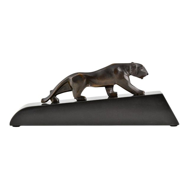 Art Deco Bronze panther sculpture, monogrammed EB Stamped Bronze. Bronze with dark brown patina on a Belgian Black marble...