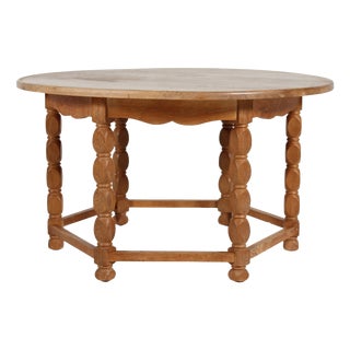 Brutalist Round Oak Coffee Table in the Style of Henning Kjærnulf and Axel Einar Hjorth, Denmark, 1970s For Sale