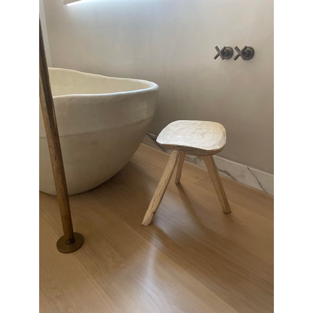 Vintage hand carved three legged stool