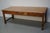 This elegant table was made in France in the late 19th century. The table was made in cherry with beautiful grain...