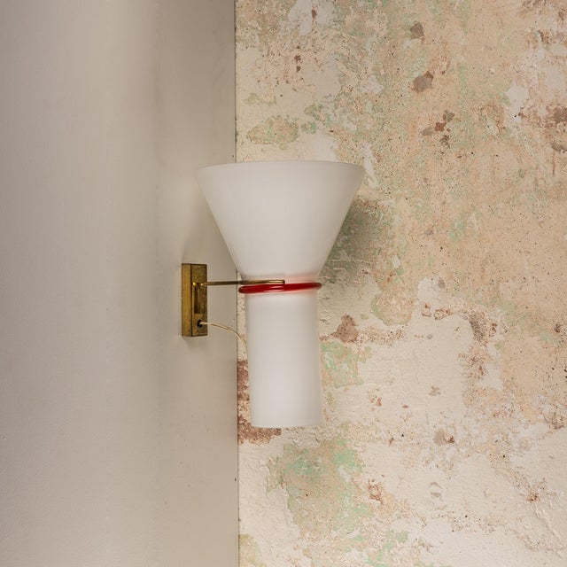 Murano Glass and Brass Wall Light, 1960s, in Very Good conditions. Designed 1960 to 1969 This piece is designed in the...